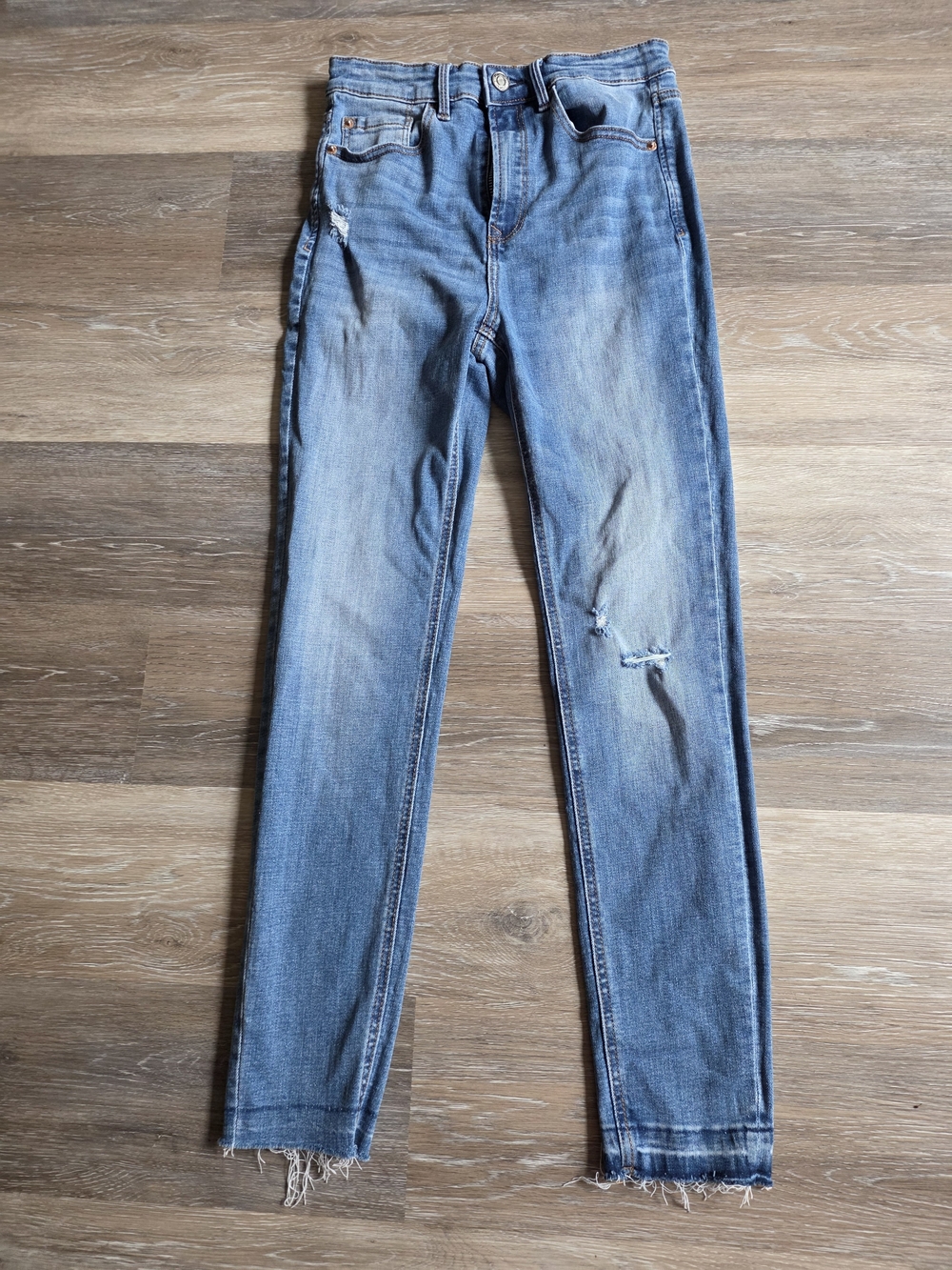 stradivarius Light Blue Skinny Jeans with Distressed Hem